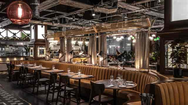 Main Dining Area at Zoya Grill: elegant decor for intimate events and meetings.