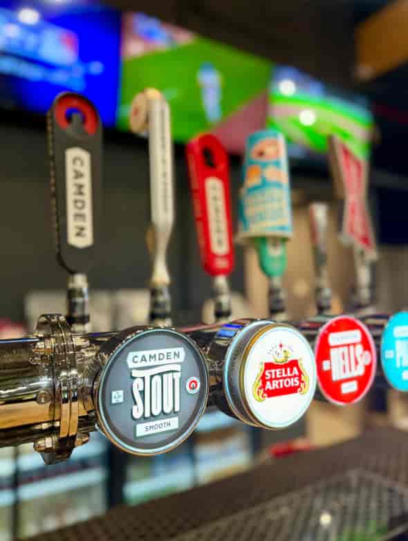 Vibrant beer taps at The 108 for engaging parties and networking events.