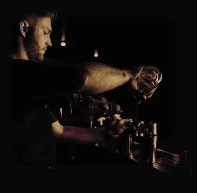 Bartender pouring a drink at Prohibition Lounge Bar, perfect for networking events.