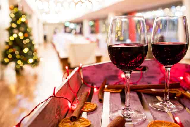 Festive Southbank Centre event space with twinkling lights and red wine for holiday celebrations.