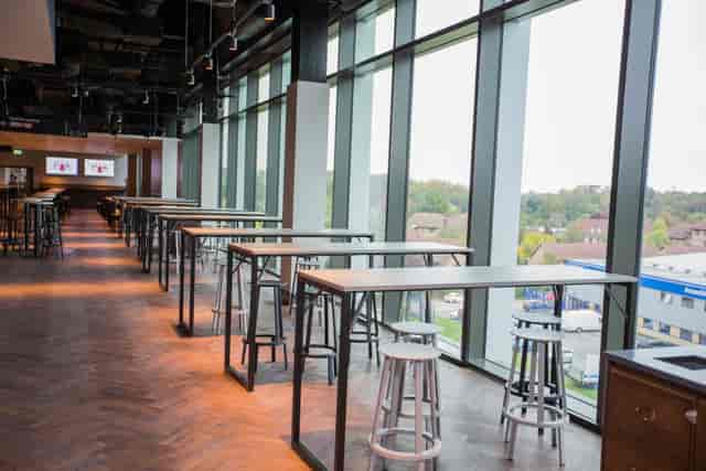 Modern event space at Clubhouse Bar & Kitchen, ideal for networking and gatherings.