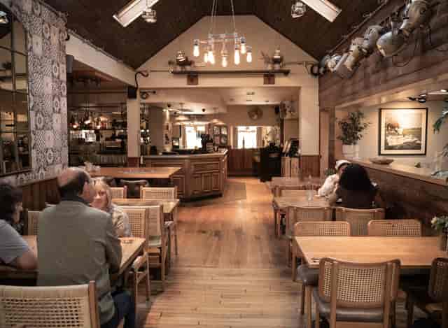 Cozy bar venue with warm decor, ideal for intimate meetings and events in Harborne.