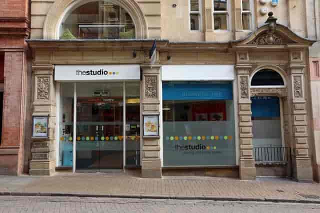 Modern event venue with large windows, perfect for meetings and conferences.