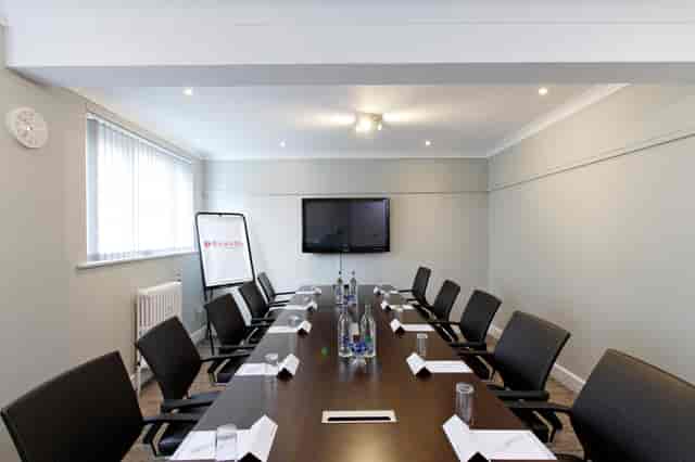 Chairman's Room at Ramada Solihull: modern meeting space for corporate events and workshops.