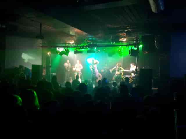 Vibrant live music venue with dynamic lighting for engaging events and performances.