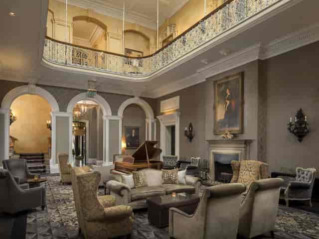 Richmond Castle Suite lobby with plush seating, ideal for networking events and receptions.