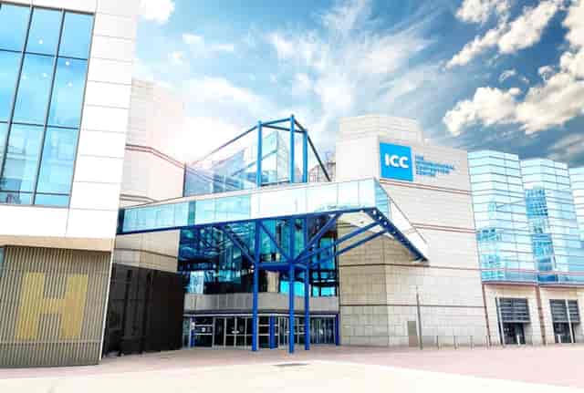 Modern ICC Birmingham meeting rooms with sleek glass facade, ideal for conferences and exhibitions.