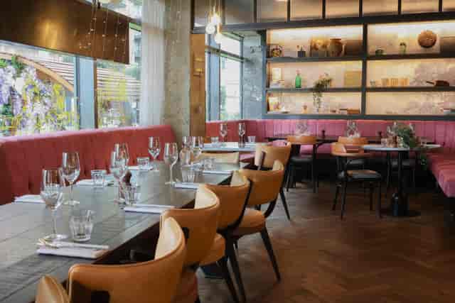 Semi-private dining area in Brasserie Blanc, ideal for corporate events and gatherings.