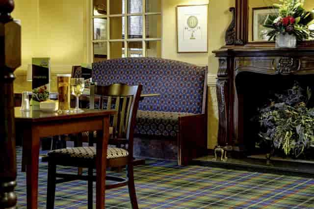 Cozy Westley Suite meeting space with classic design, perfect for intimate gatherings.