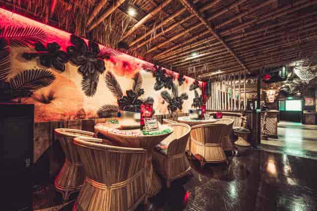 Bamboo Bar at Lola Lo Reading: vibrant tropical venue for events with rustic decor.