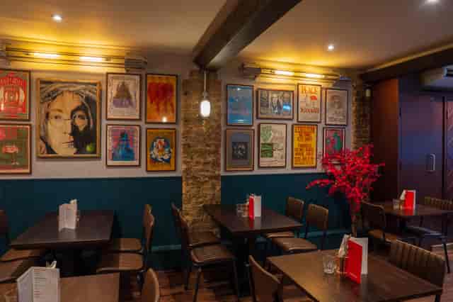 Stylish meeting space at Maxwell's Bar with vibrant decor, perfect for networking events.