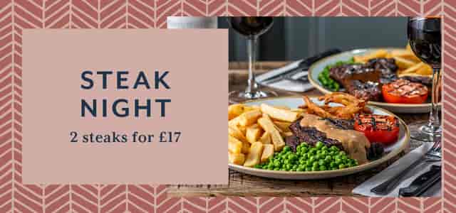 Steak Night at The Royal Oak: two steaks with fries, perfect for group dining events.