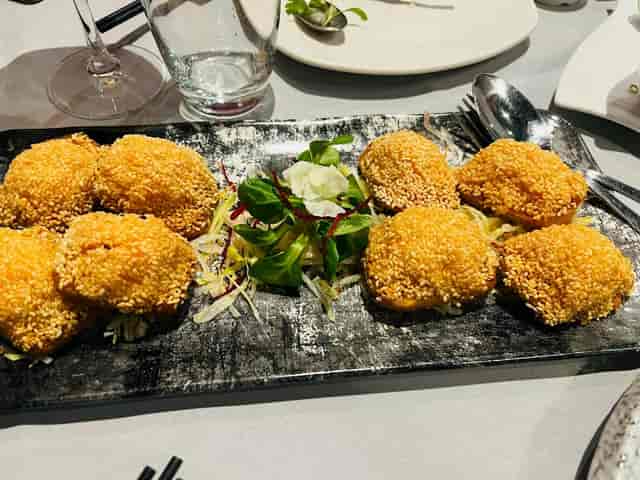Private dining suite with elegant breaded appetizers for networking receptions and formal dinners.