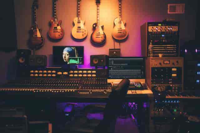 Recording studio with guitars, ideal for music events and workshops.
