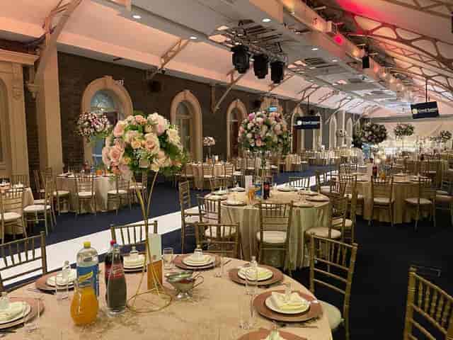 Elegant banquet hall with floral centerpieces for upscale weddings and corporate events.