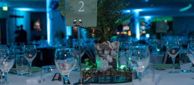 Elegant table setting with shells at Blue Riband Suite, Hall Green Stadium event.