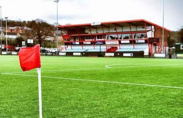 3G Pitch at Redditch United FC, vibrant red accents, ideal for sports events and gatherings.