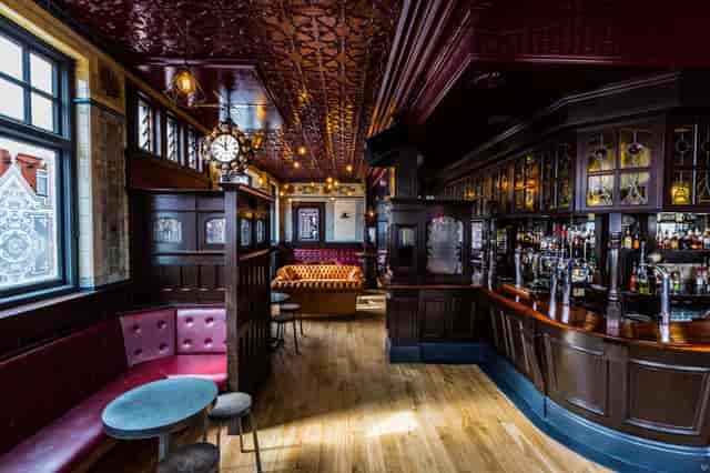 Stylish function room with warm wood finishes for intimate gatherings and cocktail receptions.
