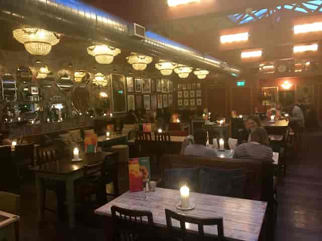 Cozy Sorrento Lounge bar with warm lighting, perfect for intimate gatherings and meetings.