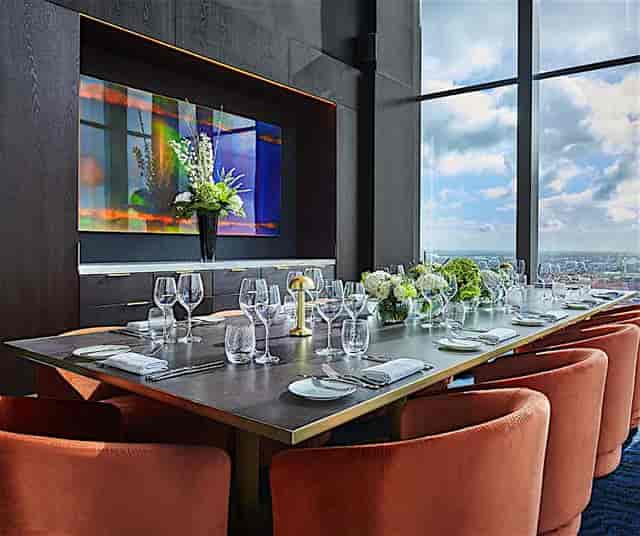Private dining room at Three Church Road with elegant table setup for corporate events.