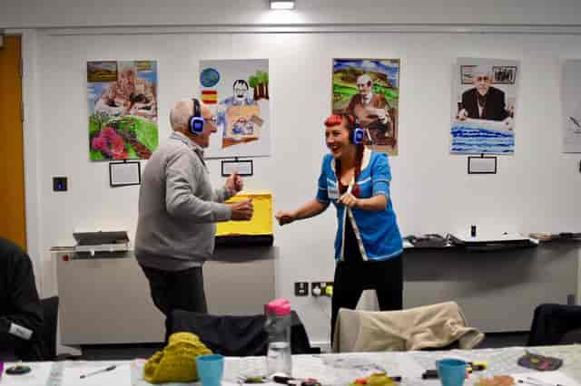 Photo booths at Silent Noize Events with participants enjoying a team-building workshop.