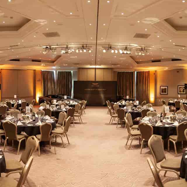 Worcester Suite at The Belfry, elegant dinner setup for corporate events and gala dinners.