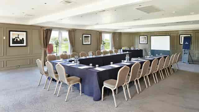 Worcester Suite meeting room with long table, ideal for corporate events and presentations.