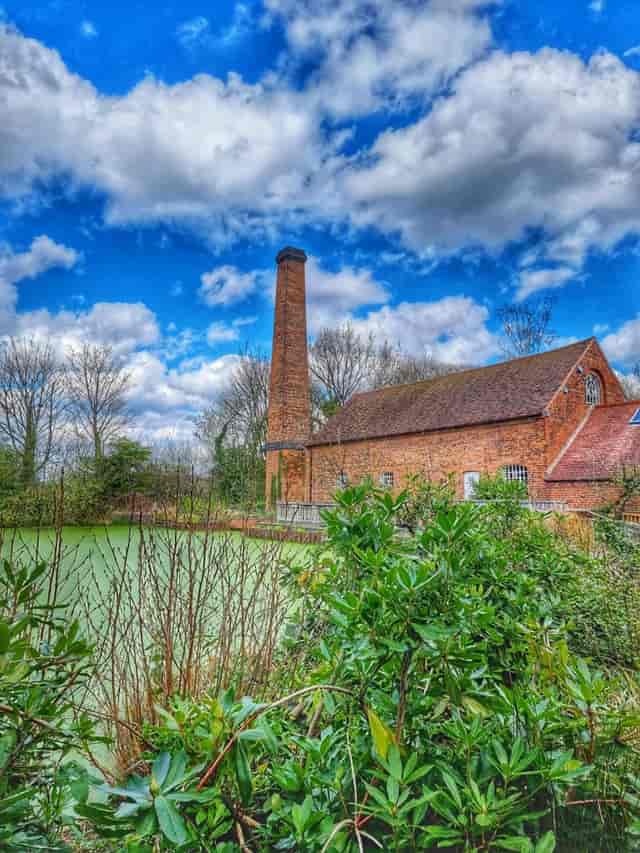 Sarehole Mill in Birmingham, rustic venue with a tall chimney for outdoor events.