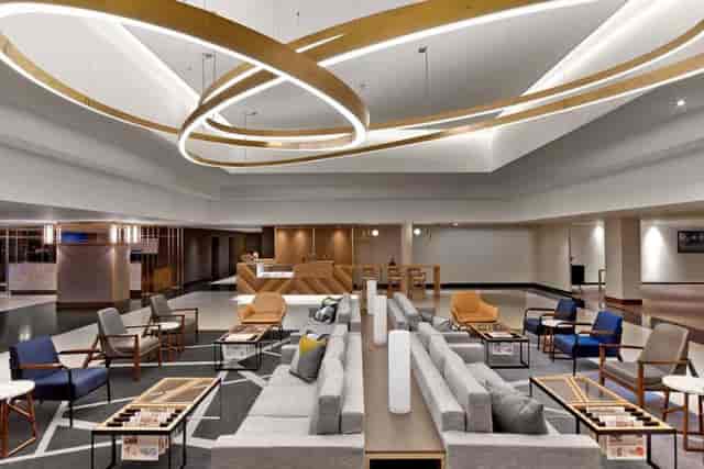 Modern lobby at Le Méridien Etoile, perfect for networking and pre-event gatherings.
