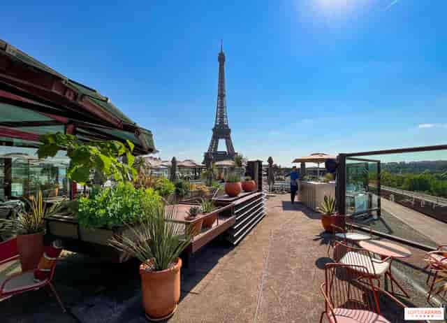 Rooftop terrace in Les Ombres with Eiffel Tower view, perfect for upscale events.