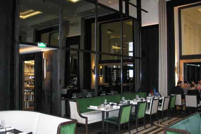 Elegant indoor hall at Café de l'Homme, perfect for corporate meetings and private events.