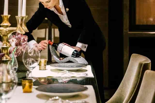 Elegant dining setup at La Cave, Hôtel du Collectionneur for upscale events and fine dining.