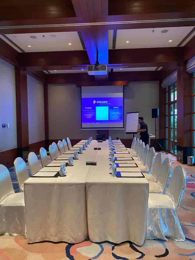 Meeting room at Sofitel Singapore with long table, ideal for corporate events and presentations.