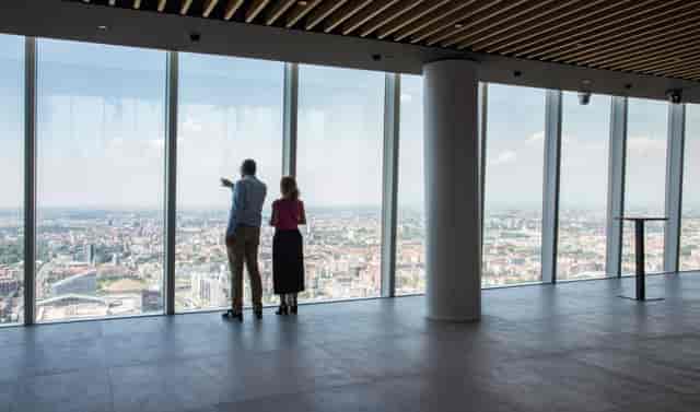 Modern event space in Tower 47 Milano with panoramic city views for corporate gatherings.