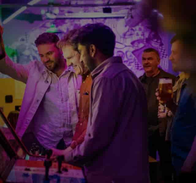 Vibrant networking venue in Four Quarters Newcastle with colorful lighting.