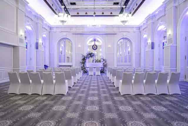 Baccarat Ballroom at Hilton Paris Opera, elegant wedding venue with purple lighting.