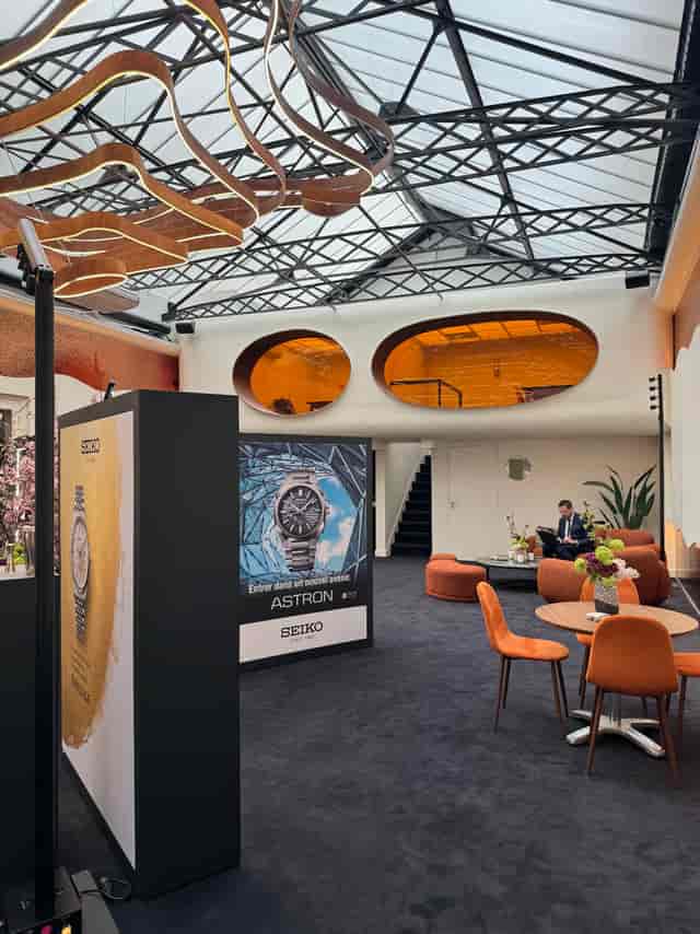 Modern event space in Maison Boétie with oval windows, ideal for luxury product launches.