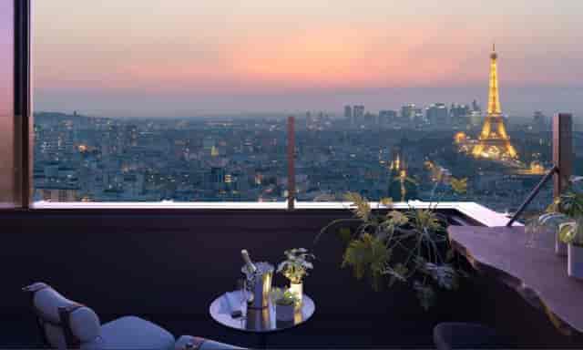 Rooftop venue in Paris with Eiffel Tower view, perfect for upscale events and gatherings.