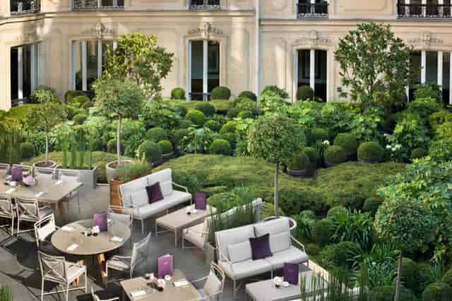 Joy at Fouquet's Paris, lush gardens for upscale events and intimate gatherings.