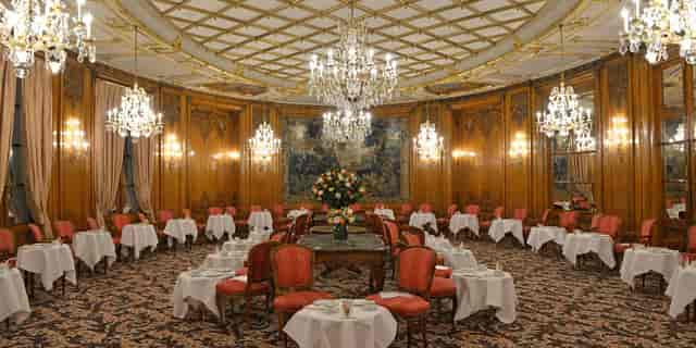 Elegant banquet hall in Le Bristol Paris, perfect for upscale events and formal dining.