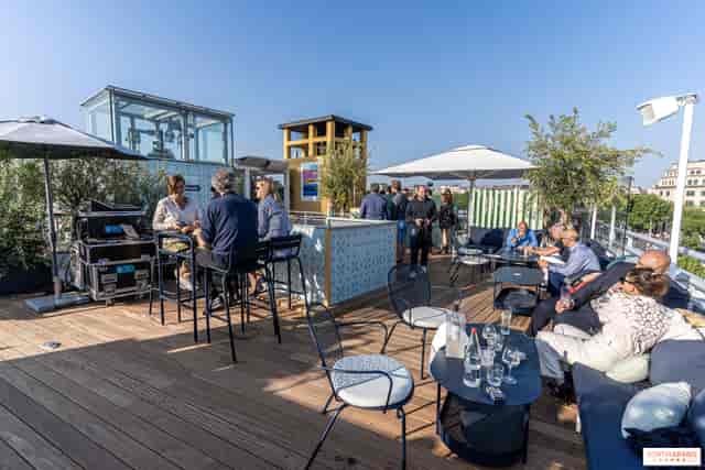 Vibrant rooftop event space with stylish seating for networking and social gatherings.