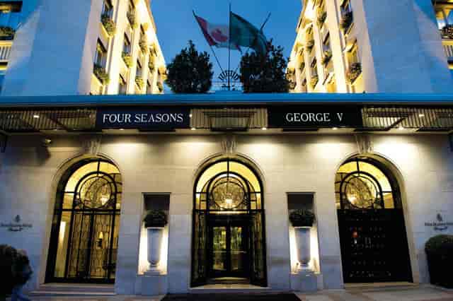 Elegant entrance of Four Seasons Hotel George V, Paris for corporate events and meetings.