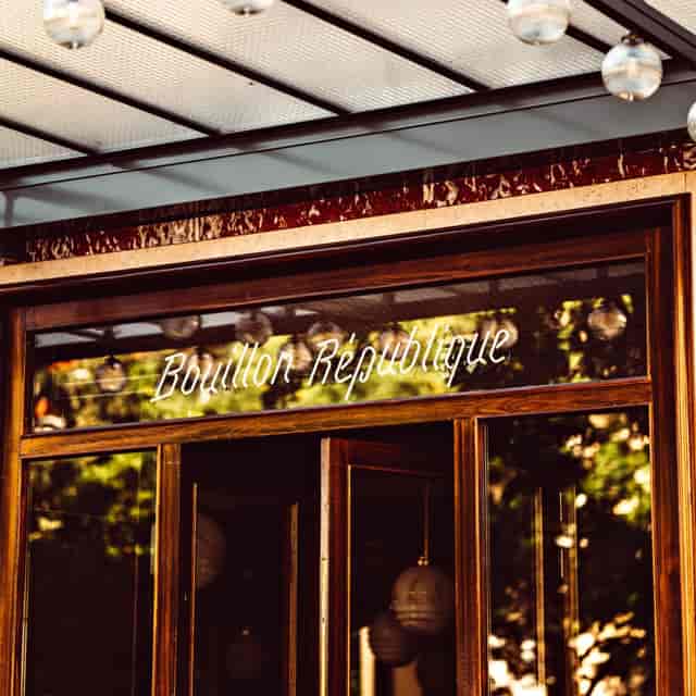 Elegant entrance of Bouillon République, ideal for upscale events and gatherings.