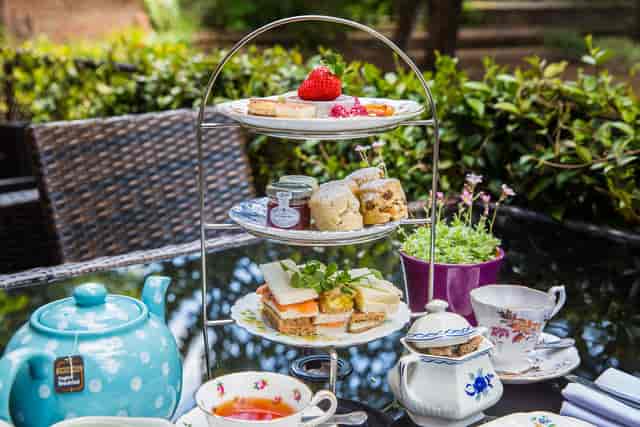 Afternoon tea setup at Gastro Pub, Tudor Barn Eltham, perfect for networking events.
