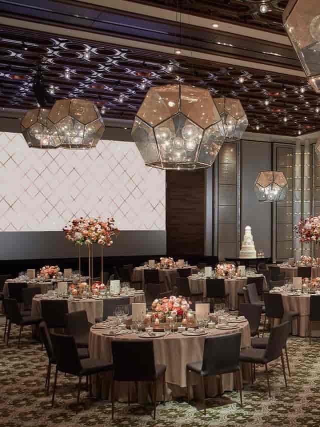 Grand Ballroom at Harbour Grand Hong Kong with elegant round tables for weddings and corporate events.