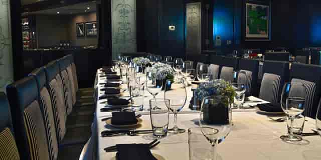 Private dining room at Morton's with elegant table setup for corporate events.