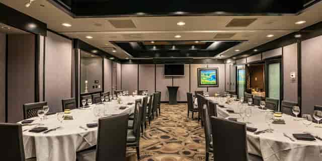 Private dining room at Morton's The Steakhouse, elegant setup for corporate events.