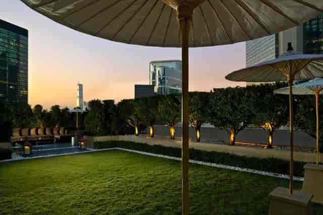 Stunning outdoor venue with lush lawn for upscale cocktail receptions and gatherings.