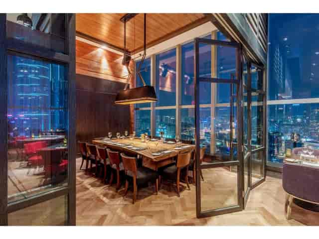 Private dining room in Wooloomooloo with panoramic city views for exclusive events.