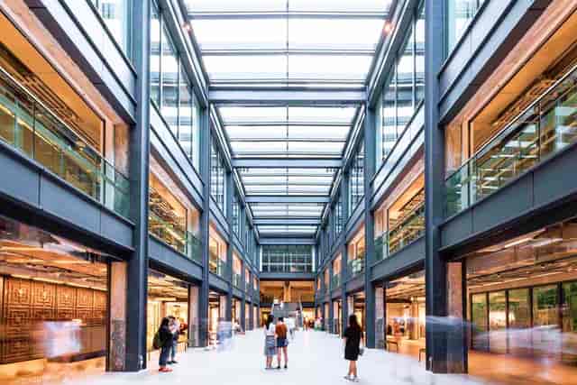 Modern event space in Fabrica Atrium with a glass ceiling, perfect for conferences and networking.